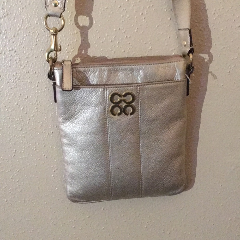 Gold coach cross body bag